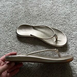 OluKai Women's Sandals in Metallic Gold